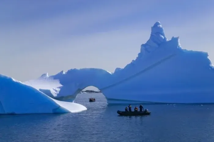 Framed Print : Tourist boat with naturally formed iceberg arch, American Palmer Station, Antarctica Framed Print : Tourist boat with naturally formed iceberg arch, American Palmer Station, Antarctica