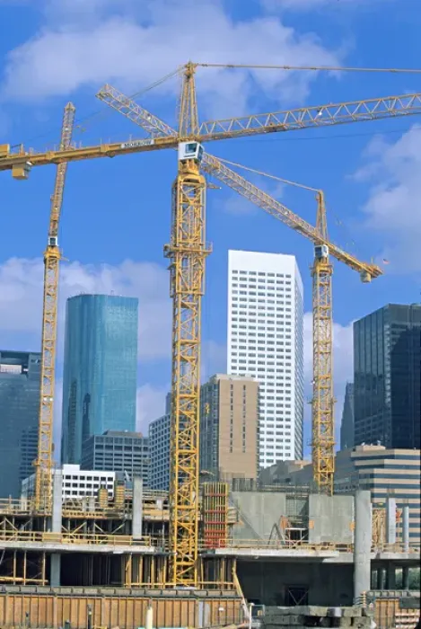 Framed Print : Tower cranes commercial construction site Framed Print : Tower cranes commercial construction site