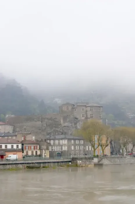 Framed Print : The town Tournon across the Rhone river with the Chateau de Tournon. under snow Framed Print : The town Tournon across the Rhone river with the Chateau de Tournon. under snow