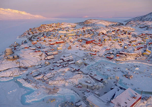 Town Uummannaq during winter in northern West Greenland beyond the Arctic Circle. Greenland, Danish territory