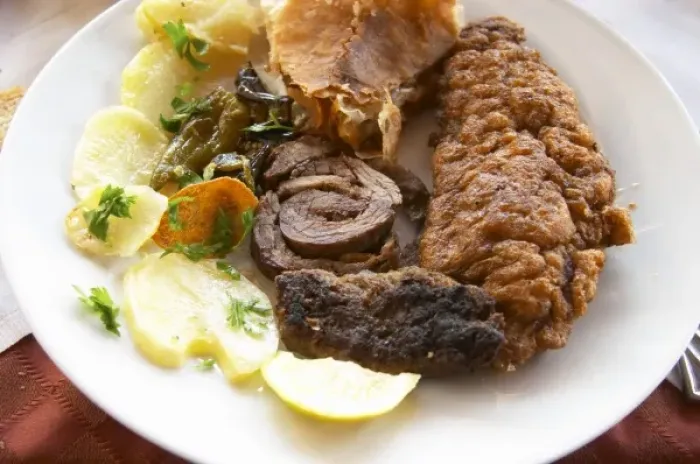 Framed Print : Traditional dish with potatoes, rolled roast lamb, fried fish, kafta meat balls. Berat lower town Framed Print : Traditional dish with potatoes, rolled roast lamb, fried fish, kafta meat balls. Berat lower town