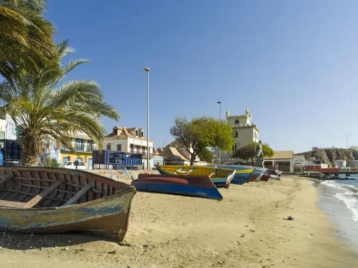 Framed Print : Traditional fishing boats on the beach of the harbor, landmark Torre de Belem in
