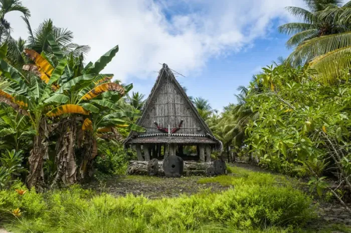 Framed Print : Traditional house with stone money in front, Island of Yap, Micronesia Framed Print : Traditional house with stone money in front, Island of Yap, Micronesia