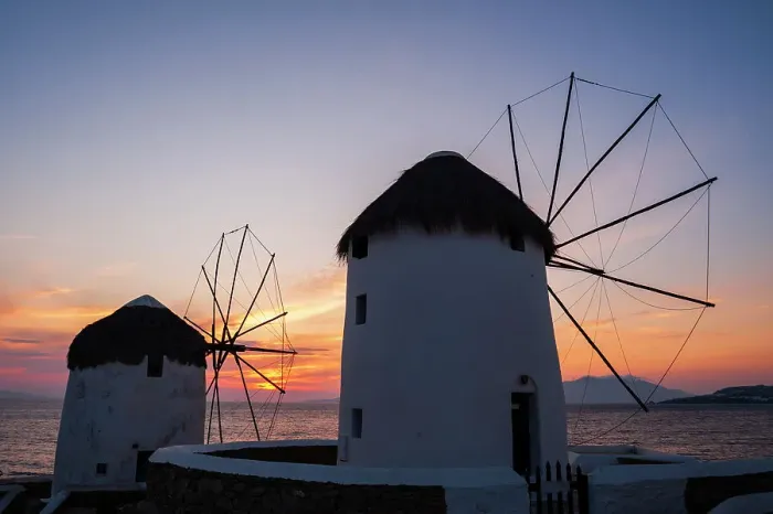 Framed Print : Traditional-style windmills on the coast at sunset. Chora, Mykonos Island, Cyclades Islands, Greece