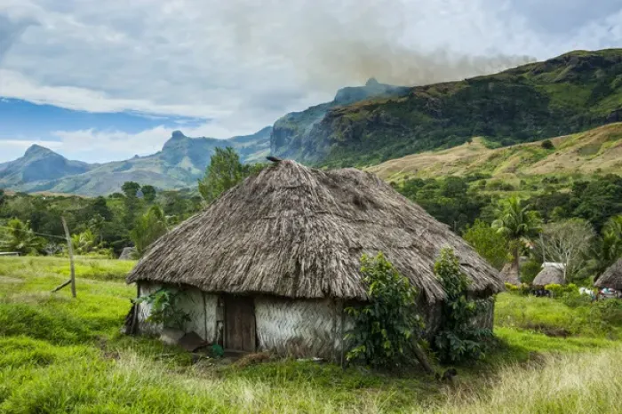 Framed Print : Traditional thached roofed huts in Navala in the Ba Highlands of Viti Levu, Fiji