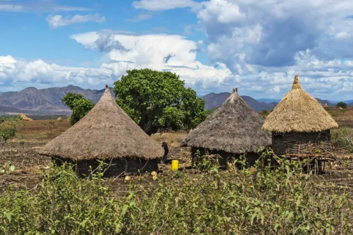 Framed Print : Traditional village houses with thatched roof with farmland in the mountain, Konso Framed Print : Traditional village houses with thatched roof with farmland in the mountain, Konso