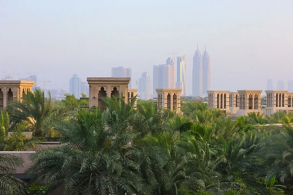 Traditional Wind Houses with modern highrises in the distance, Dubai, United Arab