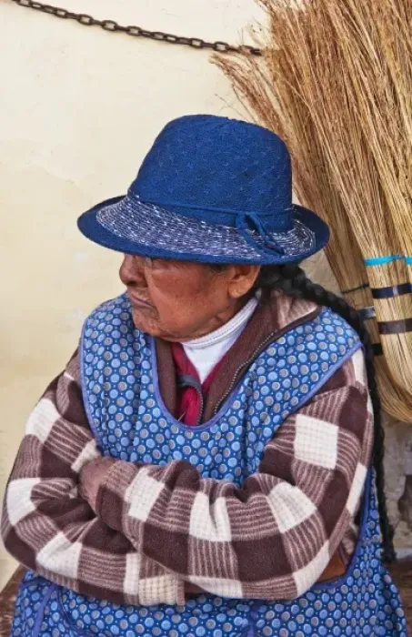 Framed Print : Traditional woman in costume selling brooms in Cuzco Cusco Peru (MR) Framed Print : Traditional woman in costume selling brooms in Cuzco Cusco Peru (MR)