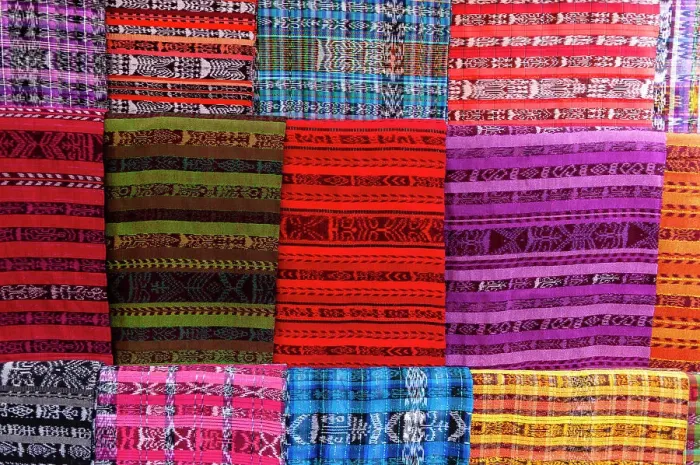 Framed Print : Traditional woven textiles for sale. Totonicapan, Guatemala Framed Print : Traditional woven textiles for sale. Totonicapan, Guatemala