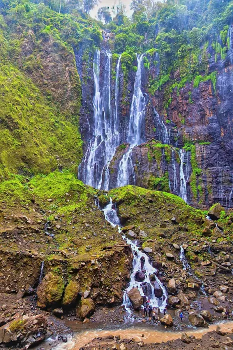 Framed Print : Tumpak Sewu is a breathtaking panoramic cascade plunging over a cliff into a turquoise pool below. It is located near Lumajang and is an adventurous hike through a Jurassic Park like canyon with multiple waterfalls