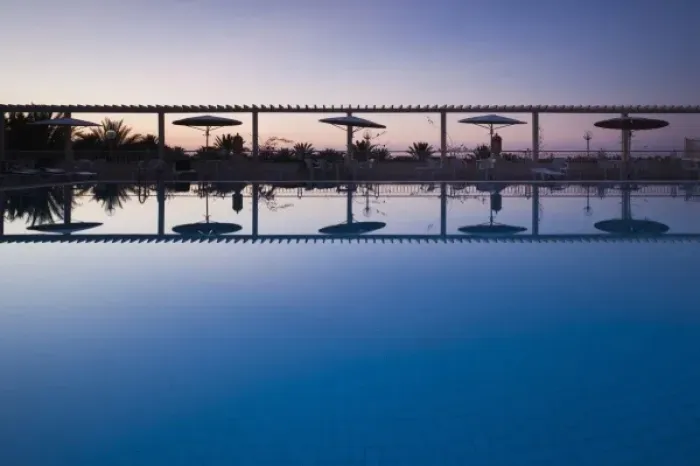 Framed Print : Tunisia, The Jerid Area, Tozeur, Hotel El Mouradi, swimming pool view, dawn Framed Print : Tunisia, The Jerid Area, Tozeur, Hotel El Mouradi, swimming pool view, dawn