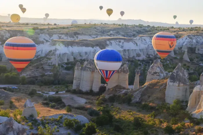 Framed Print : Turkey, Anatolia, Cappadocia, Goreme. Hot air balloons flying above / among rock formations Framed Print : Turkey, Anatolia, Cappadocia, Goreme. Hot air balloons flying above / among rock formations