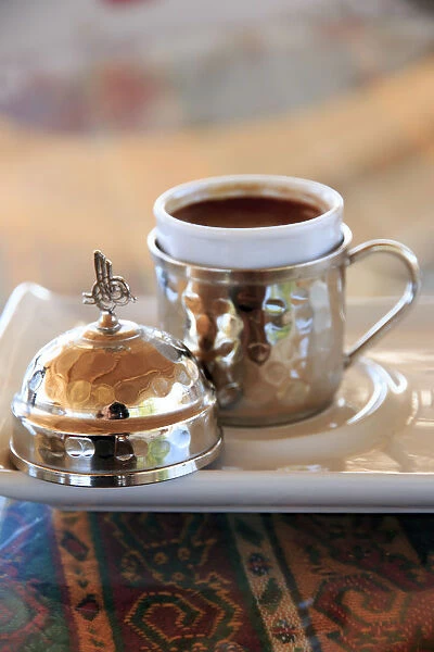 Turkey, Central Anatolia, Nevsehir Province, Uchisar cafe scene, Turkish coffee being