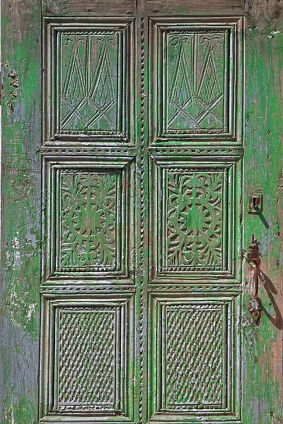 Turkey, Ephesus. Details on faded door at ancient city. Credit as