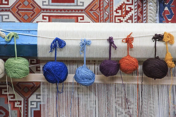 Turkey, Izmir Province, Selcuk, weaving loom, rug making, balls of wool or yarn