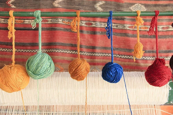 Turkey, Izmir Province, Selcuk, weaving loom, rug making, balls of wool or yarn