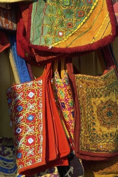 Turkish vendor selling colorful cloth purses in Cappadoccia