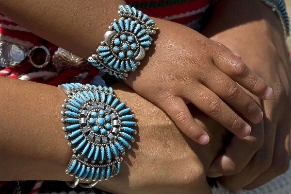 Turquoise bracelets crafted and worn by a Navajo Indian mother and daughter from Arizona, USA