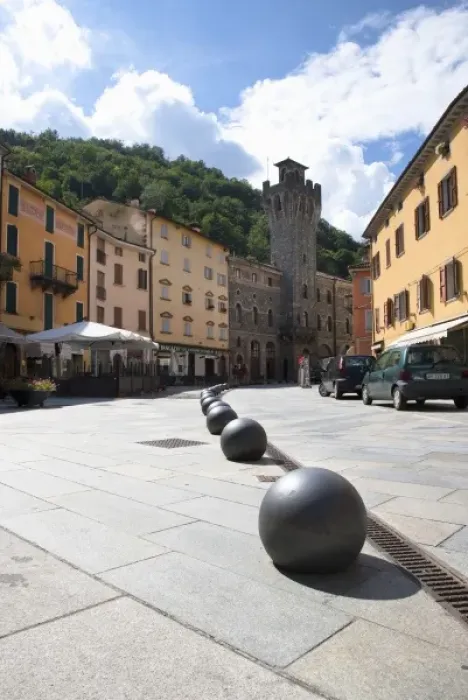 Framed Print : Tuscany, Italy - Iron balls lining the edge of a pedestrian plaza Framed Print : Tuscany, Italy - Iron balls lining the edge of a pedestrian plaza