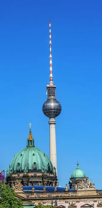 Framed Print : TV tower Fernsehturm and Berlin Cathedral, Berlin, Germany. Tower constructed in 1960's by East German communist government. Cathedral is largest Protestant church in Germany Framed Print : TV tower Fernsehturm and Berlin Cathedral, Berlin, Germany. Tower constructed in 1960's by East German communist government. Cathedral is largest Protestant church in Germany