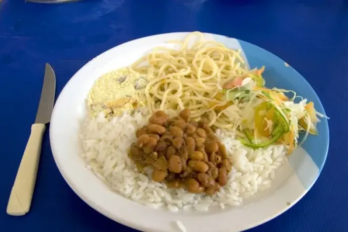 Framed Print : Typical Brazilian food consists of rice and beans with any dish, pasta is also a common item Framed Print : Typical Brazilian food consists of rice and beans with any dish, pasta is also a common item