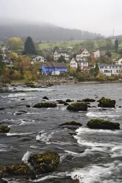 Framed Print : Typical Swiss homes along Rhein River on foggy autumn day, Schaffhausen, Switzerland