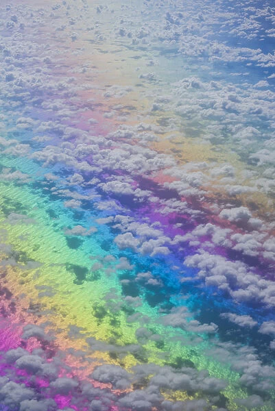 U. S. Virgin Islands, St. Thomas. Aerial view of clouds and rainbow over the Caribbean Sea