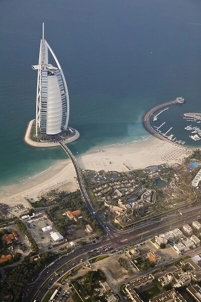 UAE, Dubai. Aerial image of Burj al Arab Hotel and Wild Wadi Water Park on Jumeirah Beach
