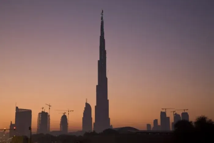 Framed Print : UAE, Dubai. Burj Dubai Hotel and surrounding buildings at sunrise
