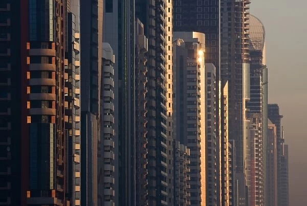 UAE, Dubai. Close-up of buildings along Sheik Zayed Road at sunrise