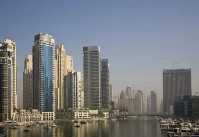Framed Print : UAE, Dubai. Marina towers with boats at anchor