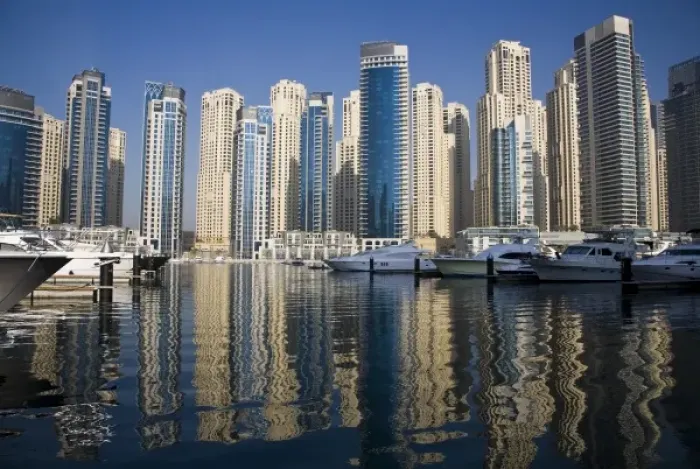 Framed Print : UAE, Dubai. Marina towers with boats at anchor