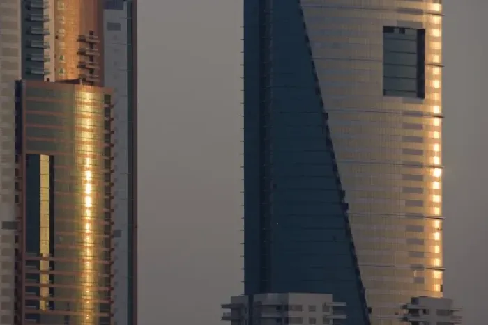 Framed Print : UAE, Dubai, Media City. Reflections on glass of Al Salam Tecom Tower in Media City