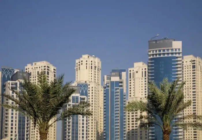 Framed Print : UAE, Dubai. Towers of Jumeirah Beach Residence with two palm trees in front Framed Print : UAE, Dubai. Towers of Jumeirah Beach Residence with two palm trees in front