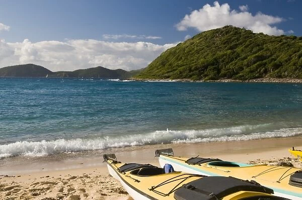 UK, British Virgin Islands, Peter Island, White Bay. Kayaks hauled out on beach