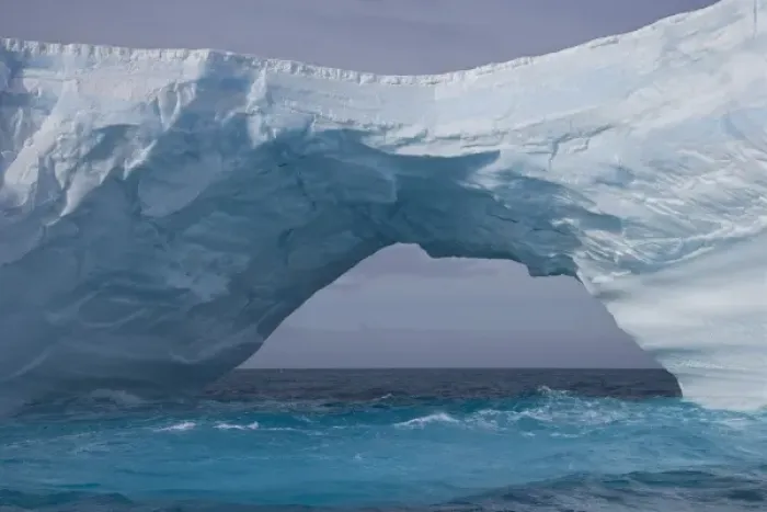 Framed Print : UK Territory, South Georgia Island, Iris Bay. Bridge and arch formed on an iceberg