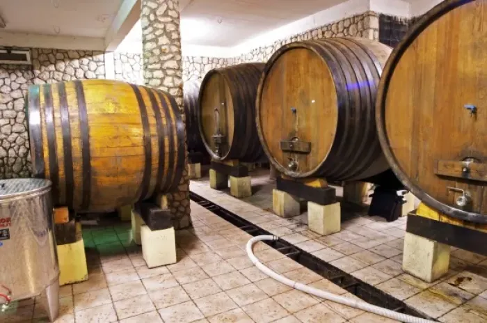 Framed Print : The underground wine cellar with old oak barrels for storing the wine. VitiI Vitaai Framed Print : The underground wine cellar with old oak barrels for storing the wine. VitiI Vitaai