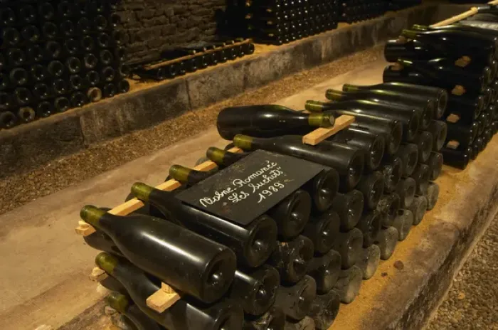 Framed Print : In the underground wine cellar: a pile of bottles of Vosne Romanee Romanee Les Suchots Framed Print : In the underground wine cellar: a pile of bottles of Vosne Romanee Romanee Les Suchots