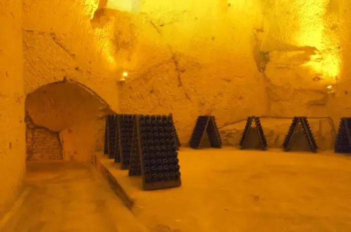 Framed Print : In the underground winecellar that is an old chalk quarry: thousands and millions of bottles aging Framed Print : In the underground winecellar that is an old chalk quarry: thousands and millions of bottles aging