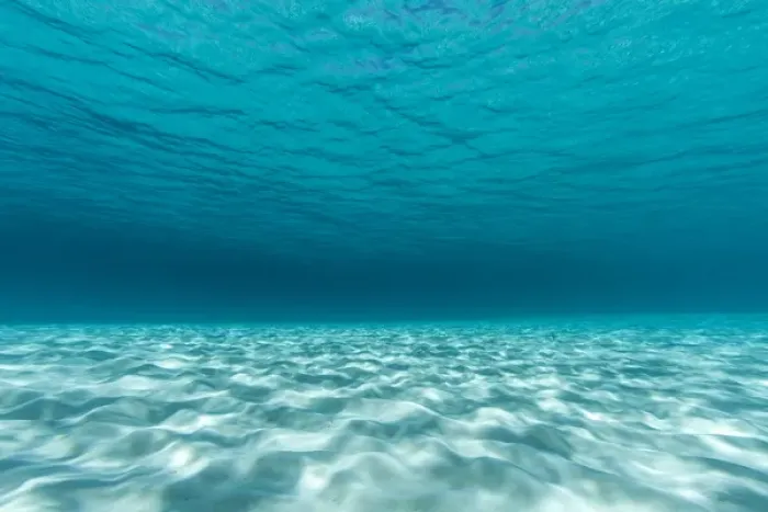 Framed Print : Underwater photograph of a textured sandbar in clear blue water near Staniel Cay