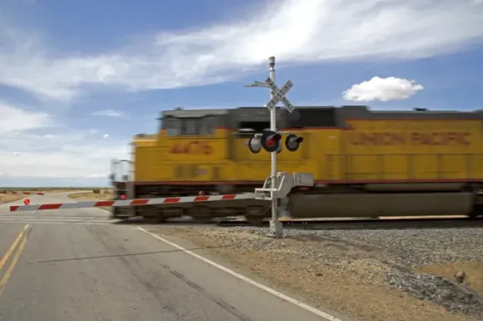 Framed Print : Union Pacific locomotive at a railroad crossing near Mountain Home, Idaho