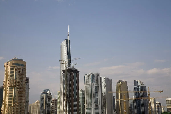 United Arab Emirates, Dubai. Building construction amid skyscrapers