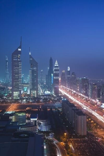 United Arab Emirates, Dubai, Dubai City. Emirates Towers and Sheikh Zayed Road Highrises