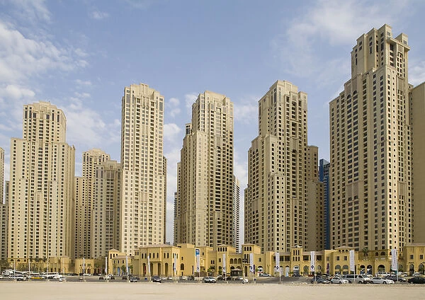 United Arab Emirates, Dubai, Marina. Jumeirah Beach Residence buildings behind beach