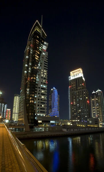 United Arab Emirates, Dubai, Marina. Roshana Tower and other buildings lit at night