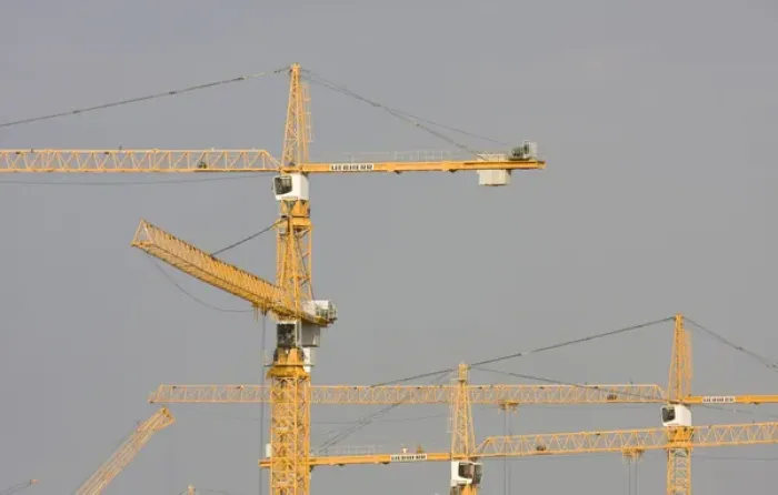 Framed Print : United Arab Emirates, Dubai, Marina. Yellow construction cranes against a grey sky Framed Print : United Arab Emirates, Dubai, Marina. Yellow construction cranes against a grey sky
