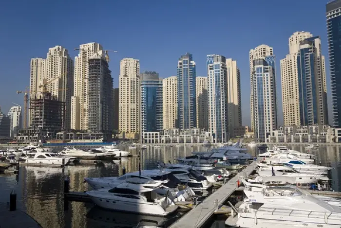 Framed Print : United Arab Emirates, Dubai. Marina towers with boats at anchor Framed Print : United Arab Emirates, Dubai. Marina towers with boats at anchor