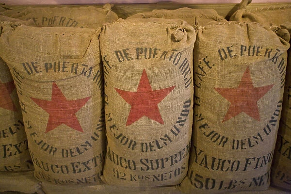 United States, Puerto Rico, Ponce. Bags of coffee beans at Hacienda Buena Vista