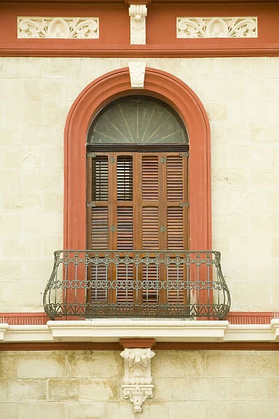 United States, Puerto Rico, Ponce. Traditional colonial architecture with wrought-iron balcony