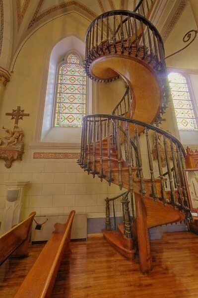 Unnique spiral wooden staircase in historic Lorretto Chapel in Santa Fe New Mexico